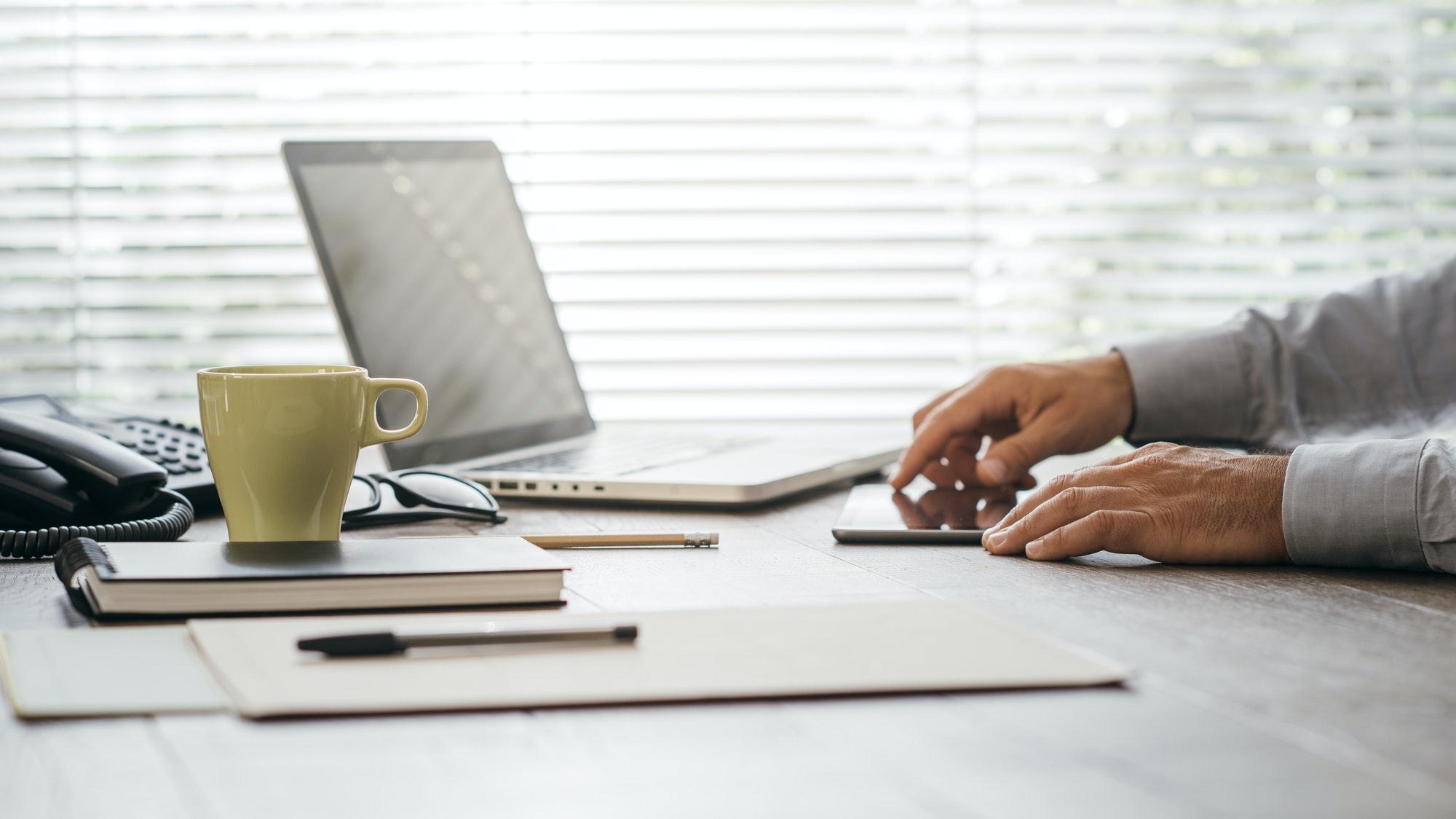 businessman working at office desk