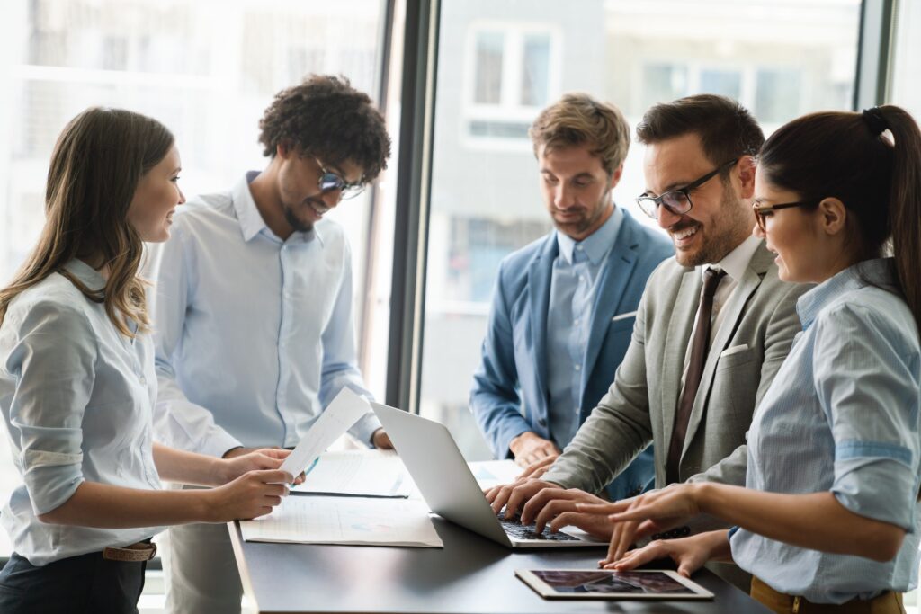 portrait of successful business team working in office.jpg
