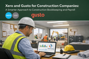 Man analyzing construction data on laptop